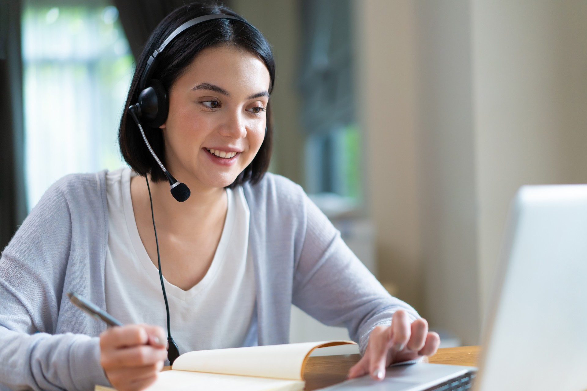 Homeschool Caucasian cute young girl student learning virtual internet online class from school teacher by remote meeting due to Covid pandemic. Male teacher teaching math calculus by using whiteboard